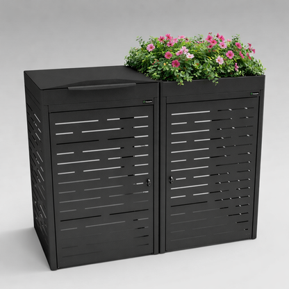 Black outdoor storage unit with a plant on a gray background